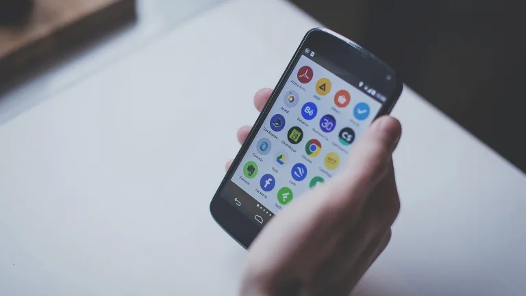 Person Holding Android Phone Person Holding Android Phone